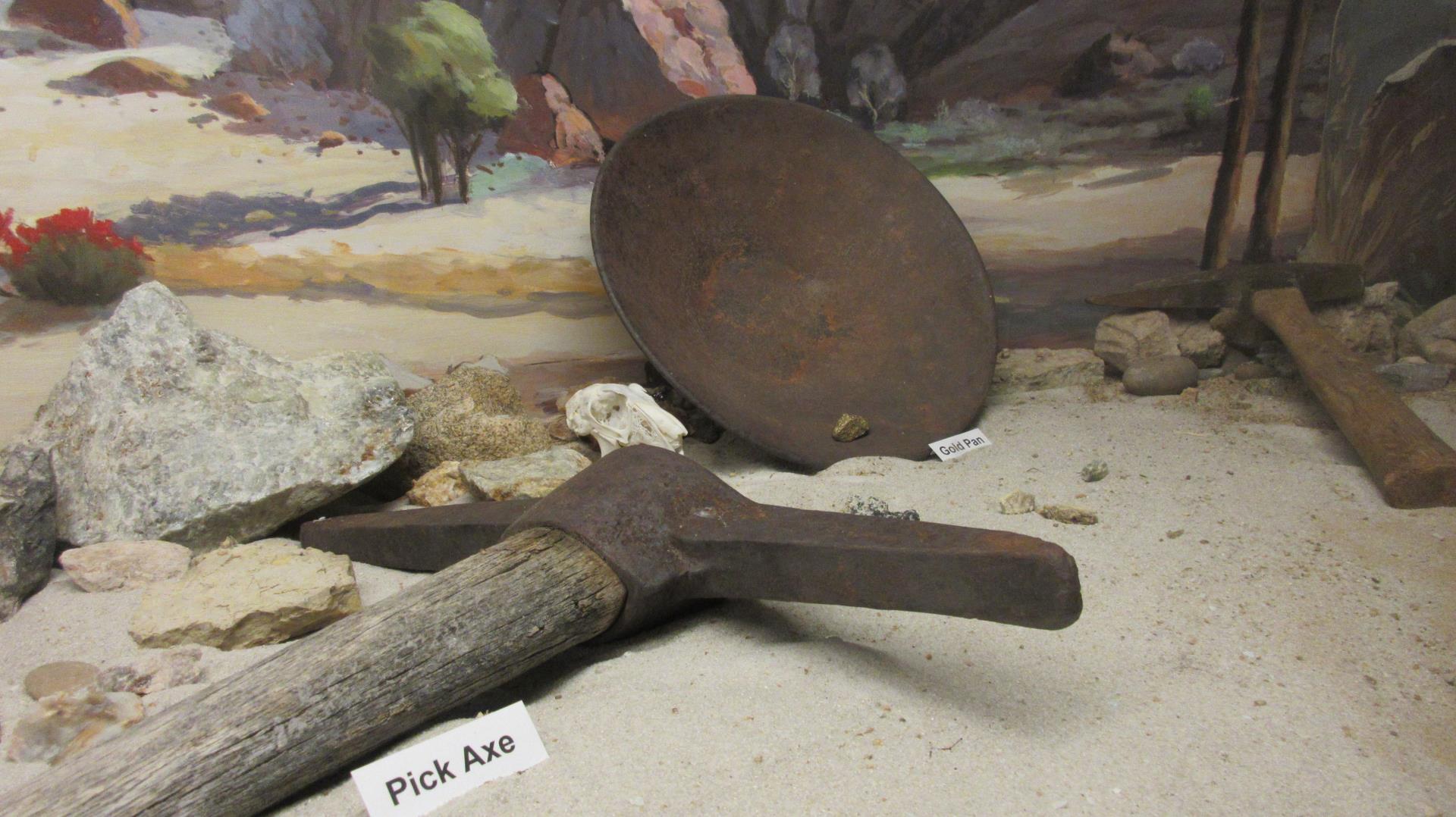 Pick axe and gold pan